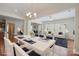An open layout showcases a bright living room and dining area with hardwood floors at 467 Granite Lake Ct, Denver, NC 28037