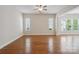 Bright and spacious living room with hardwood floors, great natural light, and modern design elements at 467 Granite Lake Ct, Denver, NC 28037