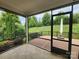 Relaxing screened porch with outdoor seating, scenic views, and a tranquil space to enjoy nature at 467 Granite Lake Ct, Denver, NC 28037