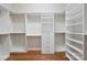 Walk-in closet with custom shelving and drawers for organized storage at 467 Granite Lake Ct, Denver, NC 28037