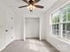 Bright bedroom with a closet, large window, and a ceiling fan at 5529 Seths Dr, Charlotte, NC 28269