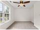 Bedroom featuring a ceiling fan and a window bringing in natural light at 5529 Seths Dr, Charlotte, NC 28269
