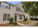 Inviting two-story townhome with neutral siding and a well-maintained front yard at 5529 Seths Dr, Charlotte, NC 28269