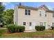 Charming townhouse with a well-maintained lawn and double doors perfect for a starter home at 5529 Seths Dr, Charlotte, NC 28269