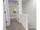 Hallway leading to a bedroom with a view of the outside at 5529 Seths Dr, Charlotte, NC 28269