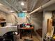 A laundry room with a washing machine, dryer, table, and window at 616 E Oakwood Ave, Albemarle, NC 28001