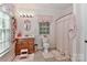 Charming bathroom with pink accents, wood vanity, and natural light at 625 Saint Andrews Rd, Statesville, NC 28625