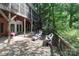 Large deck offers both covered and open seating areas, perfect for entertaining at 625 Saint Andrews Rd, Statesville, NC 28625