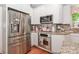 Spacious kitchen boasts stainless steel appliances, granite countertops and ample cabinet space at 625 Saint Andrews Rd, Statesville, NC 28625