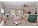 Large living room with built-in shelves, fireplace, and comfortable seating arrangement at 625 Saint Andrews Rd, Statesville, NC 28625