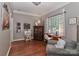 Bright office featuring hardwood floors, neutral walls, large window, and space for both work and relaxation at 625 Saint Andrews Rd, Statesville, NC 28625