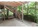 Outdoor patio area with stairs and a swing for relaxing at 625 Saint Andrews Rd, Statesville, NC 28625