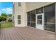Spacious wooden deck with screened-in porch perfect for outdoor enjoyment at 6718 Heritage Orchard Way, Huntersville, NC 28078