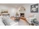 Cozy living room features a brick fireplace, neutral-toned furniture, and an inviting atmosphere at 6749 Windyrush Rd, Charlotte, NC 28226
