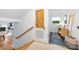 Hallway featuring a wooden barn door with the bathroom with a stylish vanity in the distance at 7123 Linda Lake Dr, Charlotte, NC 28215