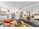 Interior featuring an open-concept design with living, kitchen, and bedroom spaces, full of natural light at 7123 Linda Lake Dr, Charlotte, NC 28215