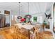 Open living space with hardwood floors, vaulted ceiling and seamless access to kitchen at 7123 Linda Lake Dr, Charlotte, NC 28215