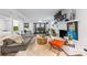 Spacious living room featuring a fireplace, modern decor, and ample natural light at 7123 Linda Lake Dr, Charlotte, NC 28215
