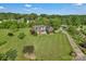 A vast lawn and a winding driveway leading to a well-maintained brick home at 814 Settlers Dr, Cherryville, NC 28021