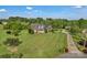 Expansive front yard, classic brick home, and private driveway highlight this property at 814 Settlers Dr, Cherryville, NC 28021