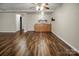 Basement area with hardwood flooring, built-in cabinets, and a sink at 814 Settlers Dr, Cherryville, NC 28021