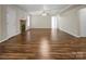 Finished basement with hardwood flooring, stone fireplace, and ceiling fan at 814 Settlers Dr, Cherryville, NC 28021