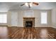 Finished basement featuring hardwood flooring, a stone fireplace, and neutral paint at 814 Settlers Dr, Cherryville, NC 28021