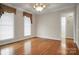 Bright dining room with elegant chandelier and hardwood flooring at 814 Settlers Dr, Cherryville, NC 28021