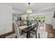 Cozy dining area adjacent to the kitchen and living room, perfect for entertaining and Gathering meals at 917 Dent Ct, Charlotte, NC 28210