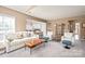 Inviting living room with open floor plan to kitchen, offers a comfortable and connected living space at 9710 Holden Ct, Charlotte, NC 28277