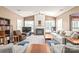 Spacious living room with fireplace, vaulted ceilings, and ample natural light offers a cozy atmosphere at 9710 Holden Ct, Charlotte, NC 28277
