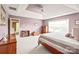 Bright main bedroom with neutral carpet and large window offering ample natural light at 9710 Holden Ct, Charlotte, NC 28277