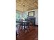 Traditional dining room featuring wood floors, a fireplace, and a rustic wood-paneled ceiling at Tbd Jerusalem Church Rd, Marshville, NC 28103