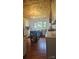 Bright kitchen featuring an island, white cabinets, and wood floors at Tbd Jerusalem Church Rd, Marshville, NC 28103