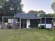 View of the home's backyard featuring a covered patio at 1014 Skyway Dr, Kannapolis, NC 28083