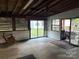 Covered patio with windows and sliding door at 1014 Skyway Dr, Kannapolis, NC 28083
