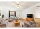 Inviting living room with plush seating, neutral decor, and ample natural light at 103 Palace Pt, Kings Mountain, NC 28086