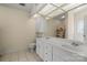 Bathroom featuring double sinks and white cabinets at 112 Chasse Ct, Cleveland, NC 27013