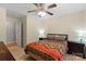 Cozy bedroom featuring a ceiling fan and bright colorful bedding at 112 Chasse Ct, Cleveland, NC 27013