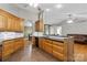 Spacious kitchen with wood cabinets and a view into living spaces at 112 Chasse Ct, Cleveland, NC 27013