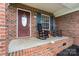 Cozy front porch with rocking chairs, perfect for relaxing outdoors at 112 Chasse Ct, Cleveland, NC 27013