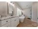Bathroom featuring a soaking tub, glass enclosed shower, marble countertops, and modern fixtures at 1134 Fincher Rd, Fort Lawn, SC 29714