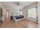 Comfortable bedroom with built in shelving and ample natural light with beautiful hardwood floors at 1134 Fincher Rd, Fort Lawn, SC 29714