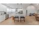 Open concept kitchen features a central island with bar stool seating and stainless steel appliances at 1134 Fincher Rd, Fort Lawn, SC 29714