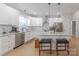 Bright kitchen with white cabinetry, stainless appliances, and granite countertops at 1134 Fincher Rd, Fort Lawn, SC 29714