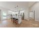 Spacious kitchen featuring a central island with seating, stainless appliances and light cabinetry at 1134 Fincher Rd, Fort Lawn, SC 29714