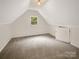 Bedroom with carpet flooring and a dormer window at 1212 Beechdale Dr, Charlotte, NC 28212