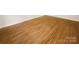 Empty bedroom with hardwood floors perfect for customization to suit any style at 1212 Beechdale Dr, Charlotte, NC 28212