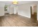 Bright bedroom with hardwood floors, natural light, and neutral paint at 1212 Beechdale Dr, Charlotte, NC 28212
