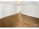 Bright, airy bedroom with hardwood floors, and neutral paint at 1212 Beechdale Dr, Charlotte, NC 28212